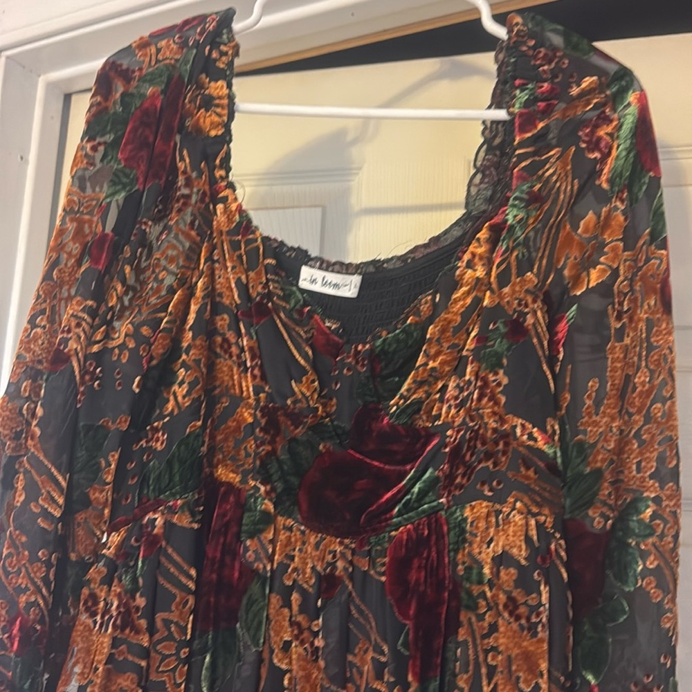 Woman’s long elegant velvet dress
